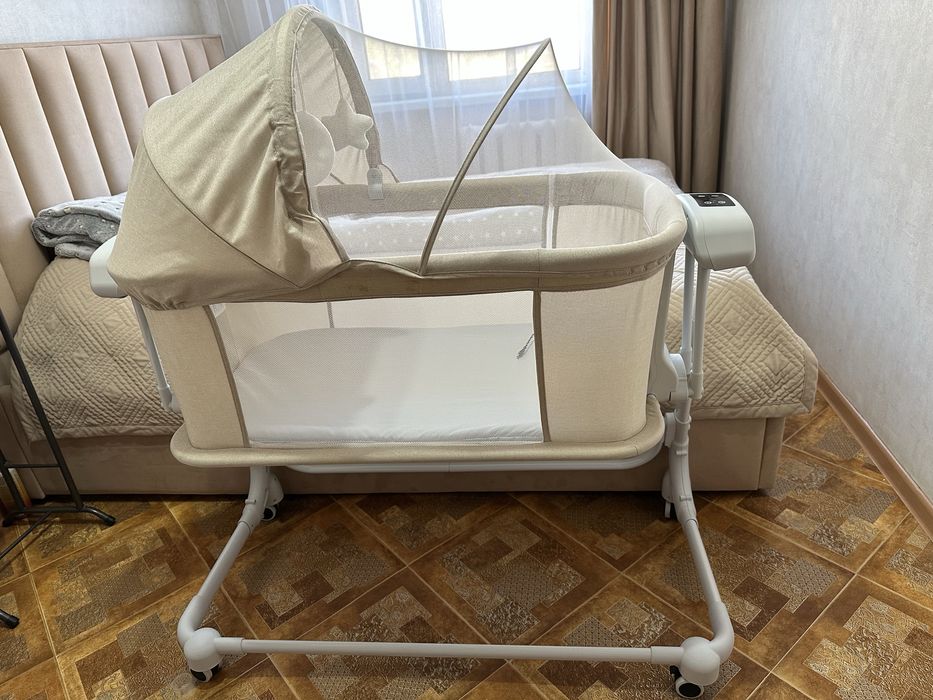 Продам манеж-колыбель. В отличном состоянии.