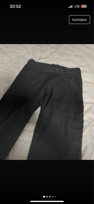 pantaloni de material evazati