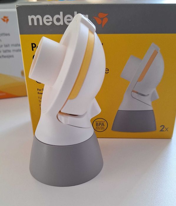 Помпа за кърма Medela Swing с всички необходими части + подарък