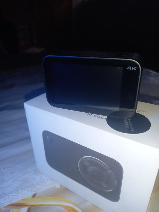 Mi экшен камера сотилади стаблизатори билан бирга  сёмка 4ка олади