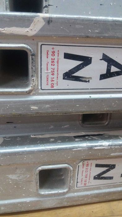 Телескопическая передвижная лестница