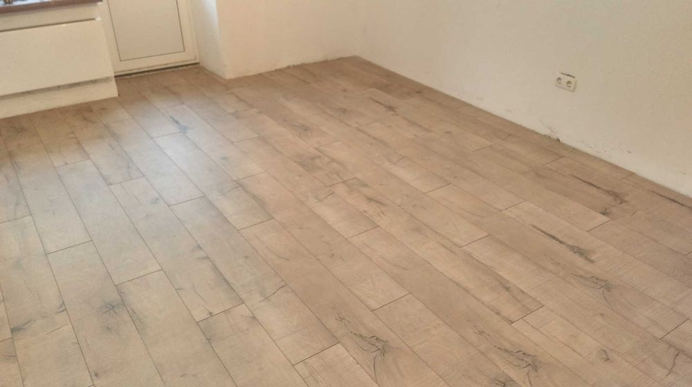 Укладка ламината. Гарантия, качество.