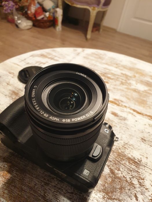 Panasonic 12-60 aproape ca nou