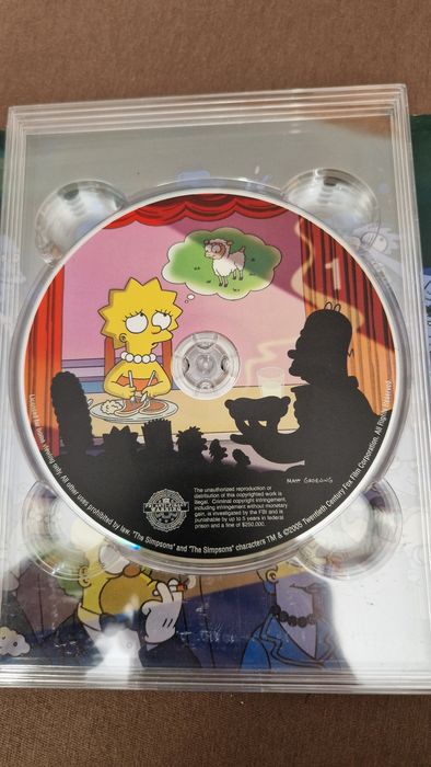 Set 4 dvd-uri sezonul 7 "Familia Simpson"