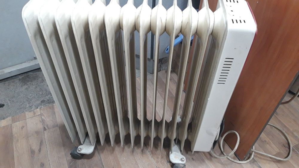 Маслений печка ишлаб турган