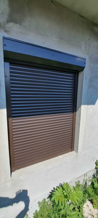 RULOURI Aluminiu si Usi de garaj rezidentiale SECTIONALE