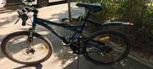 Bicicleta full suspensie si discuri de frana