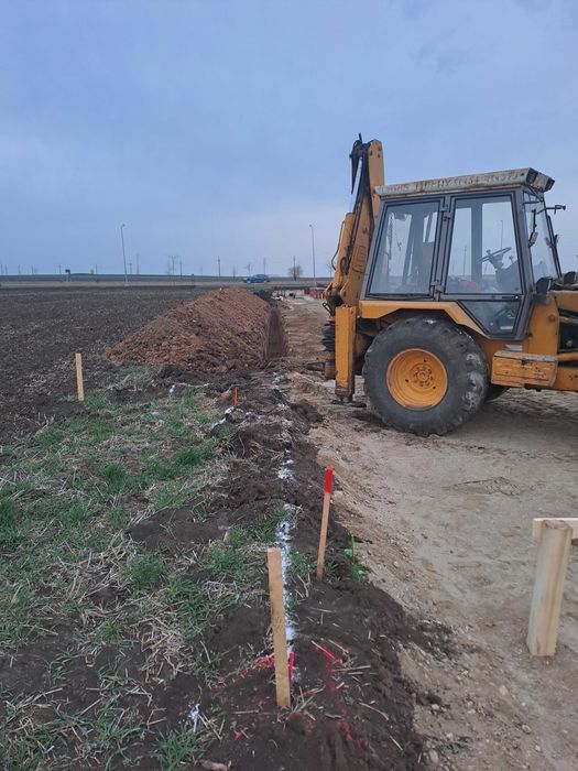 Buldoexcavator de inchiriat Basculanta 10 T  de inchiriat