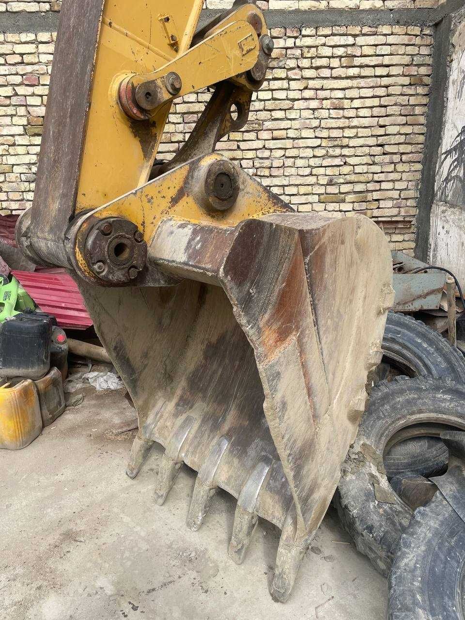 Колесный экскаватор CAT M318D