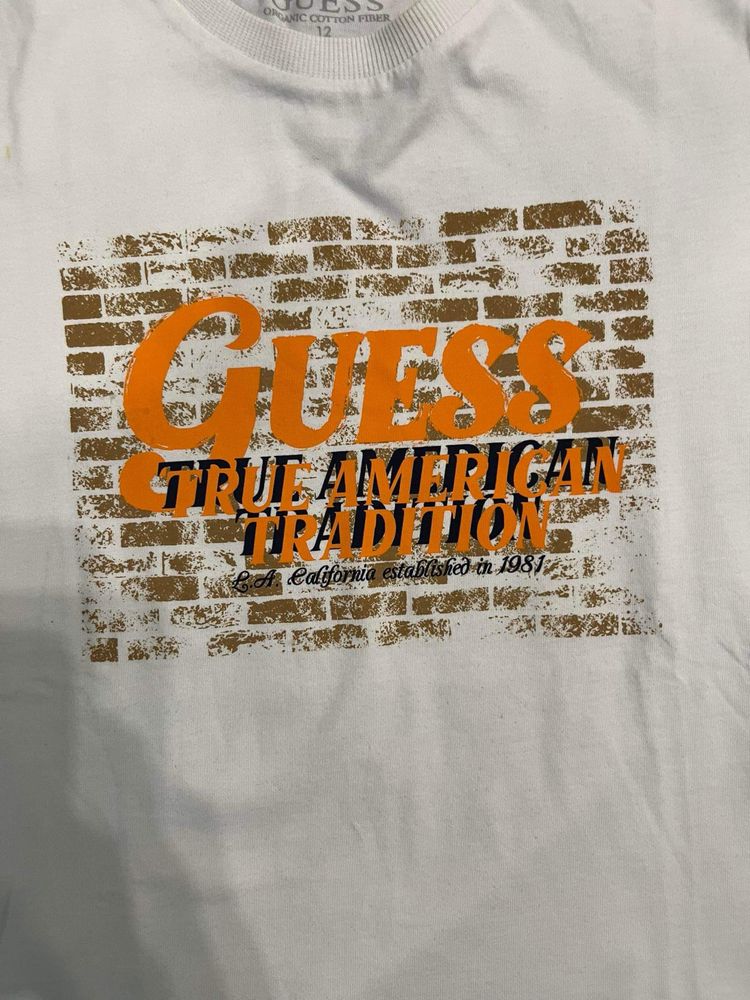 Guess -12 год