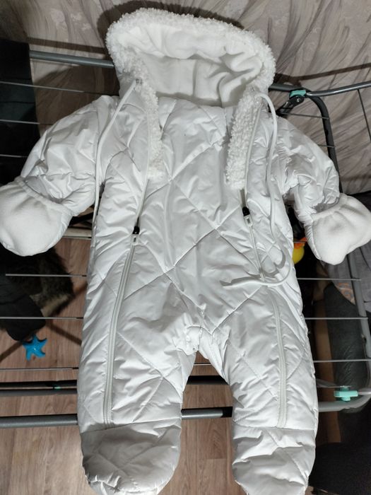 Комбинезон и конверт на новорожденных