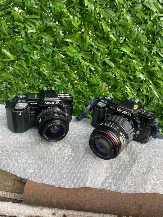 Продавам два филмови фотоапарата Minolta 7000 с обективи
