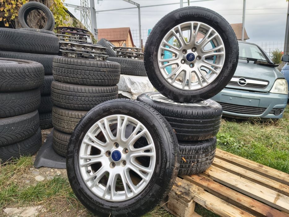 Jante aliaj originale Ford R16 5x108 cu anvelope 215.55.r16