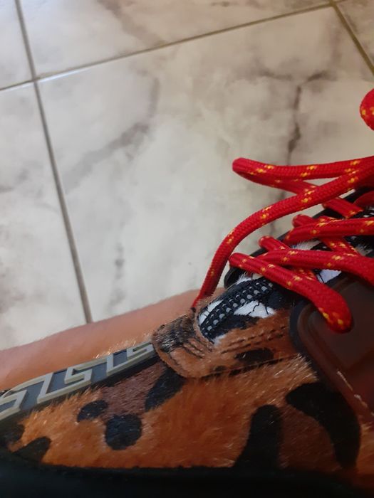 Versace chain reaction leopard print