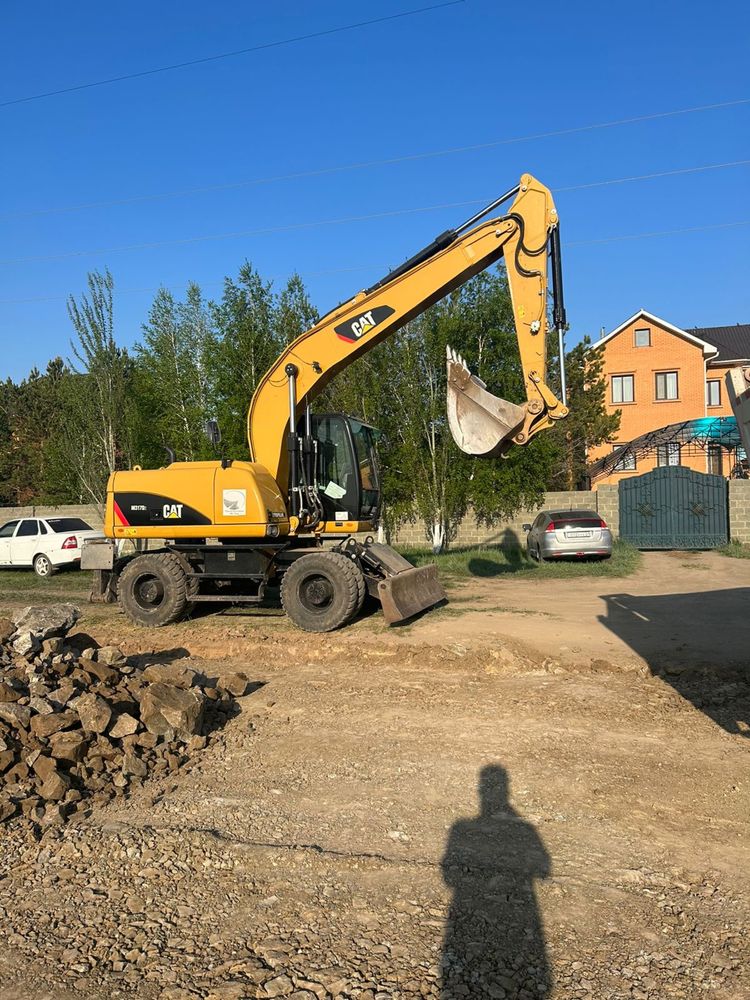 Аренда, услуги заказ колесного экскаватора ковш 1куб-3