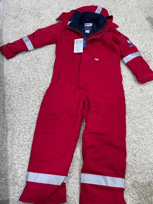 Продам зимний комбинезон 48-50р