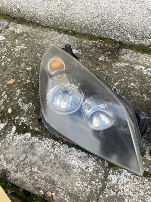 Vand faruri opel astra h