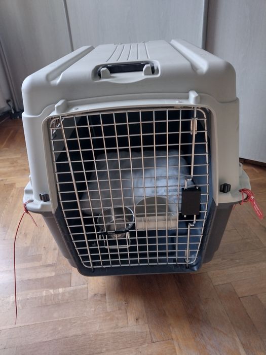 Транспортна клетка за куче на колелца