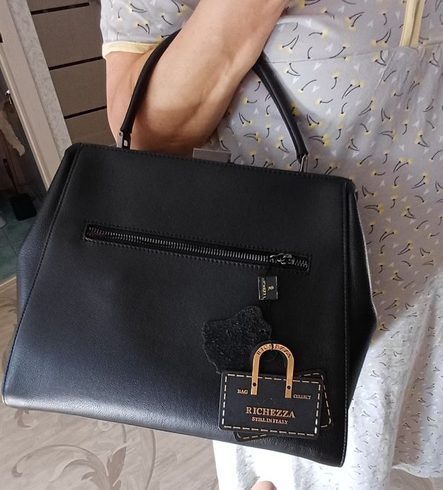 Продам брендовую кожаную сумку