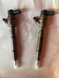 Vand 2 injectoare hyundai ix35 1,7 TDI 2011