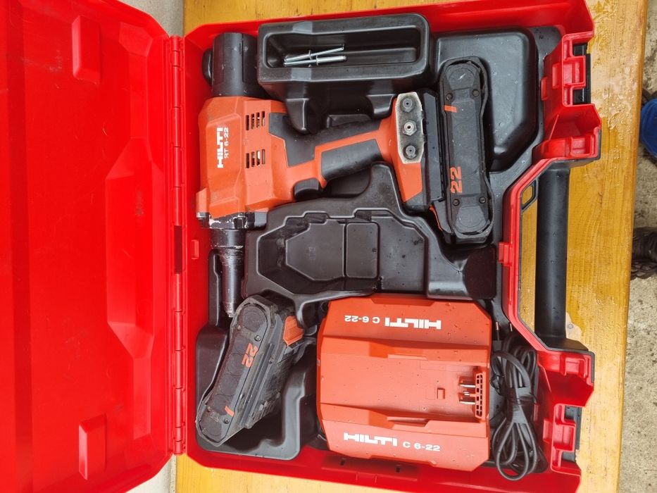 Pistol popnituri Hilti rt6 23 nuron. 2 baterii incarcator si cutie