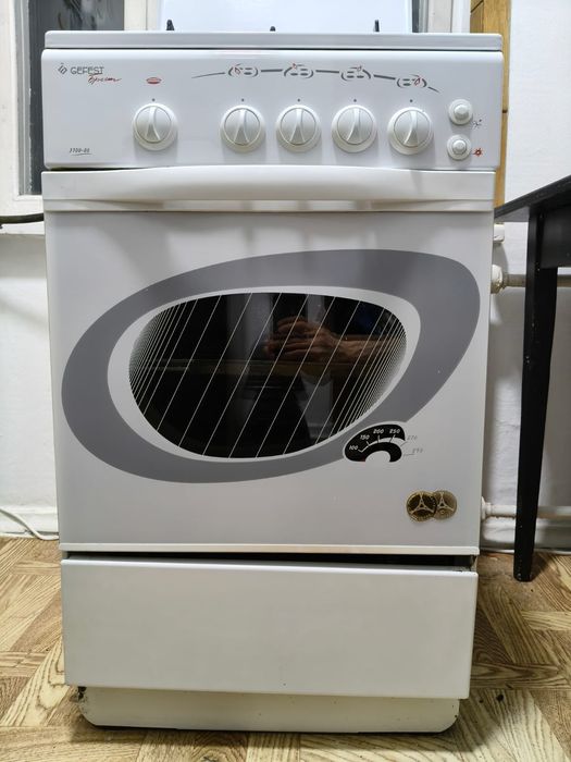 Газовая плита с духовым шкафом