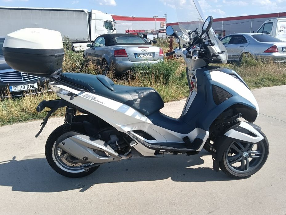 Scuter 3 roti piaggio mp 3 categoria b  2013