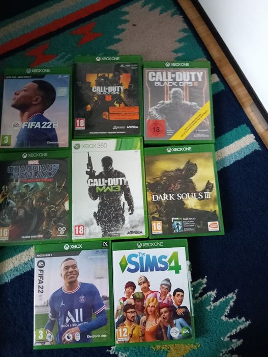 Xbox one x,1 TB memorie ,2 controllere + 8 jocuri