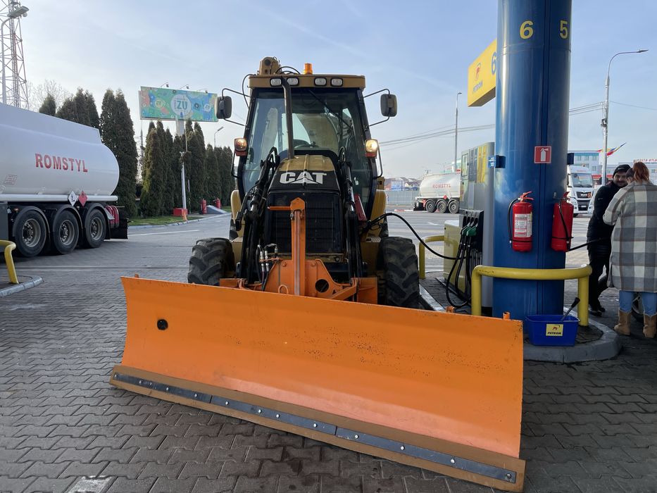 Lama zapada buldoexcavator CAT caterpillar