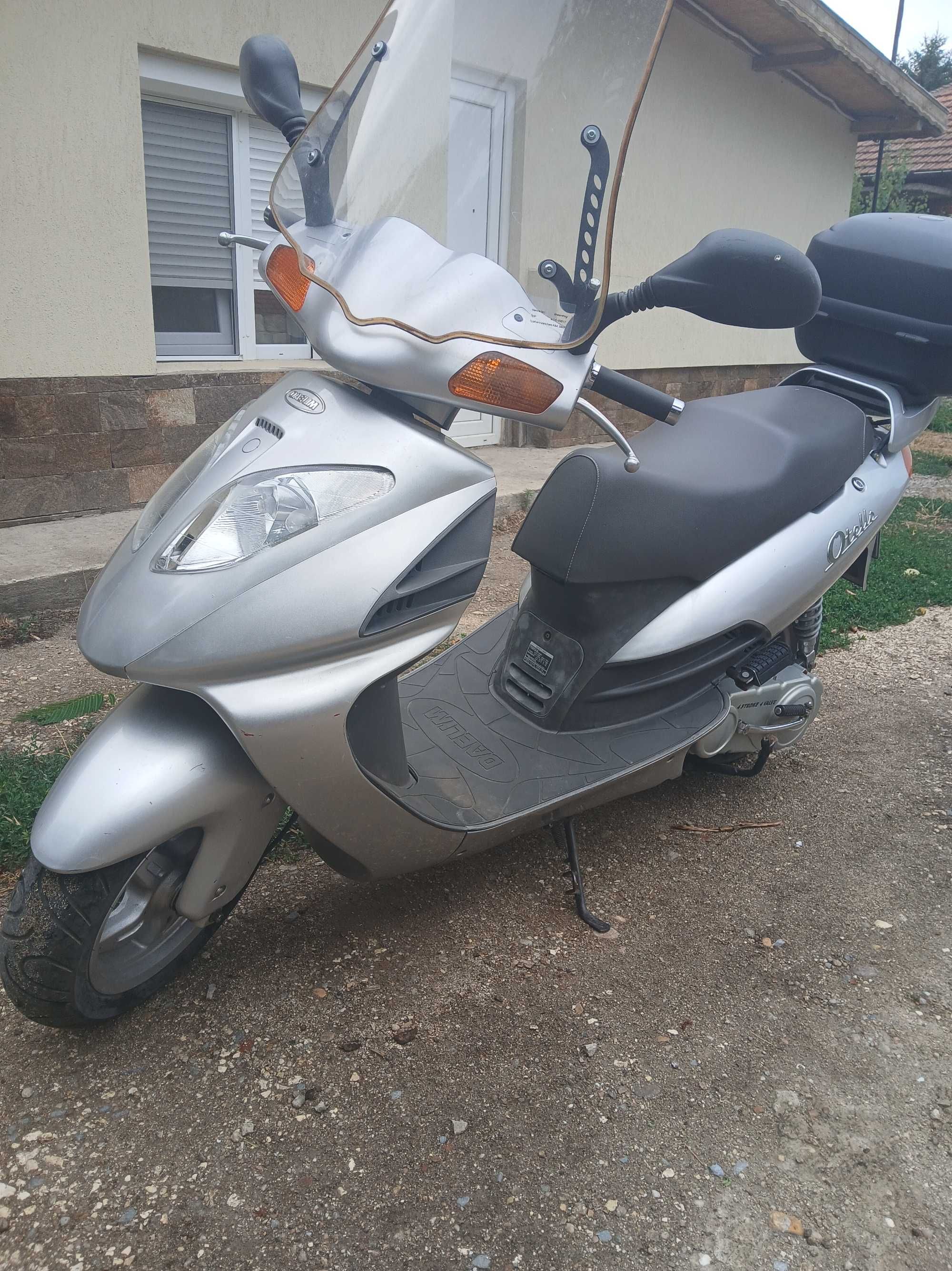 Скутер 125 кубика