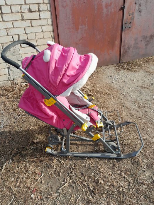 Детские санка  с колесиках