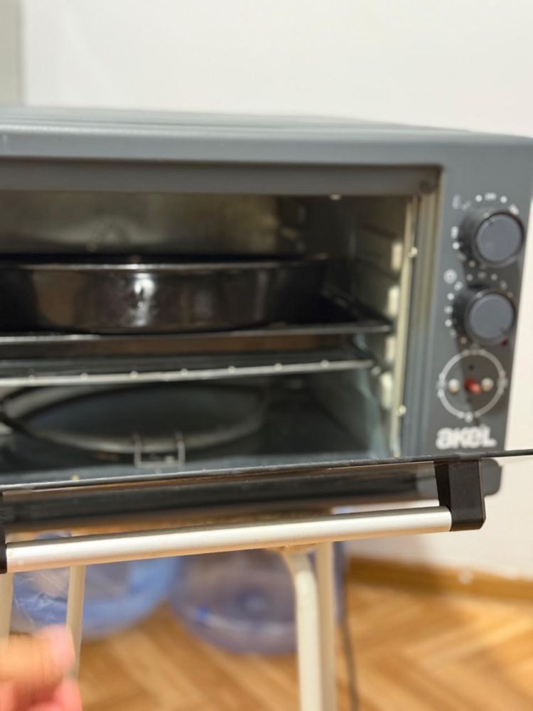 Духовка akel и контейнер вращающая в отличном  хорошем состояний даже