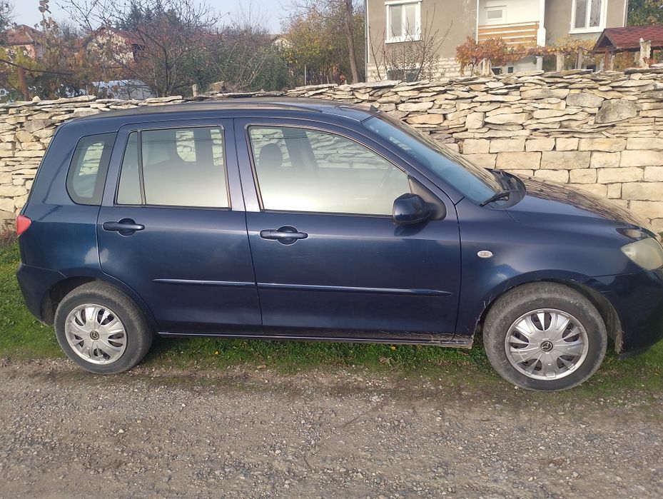 Мазда 2 1.4 бензин/газ