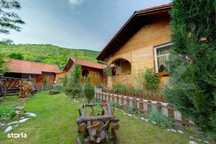 Complex turistic cu 8 cabane,25 de camere,sauna,jacuzzi,ciubar,Sugag