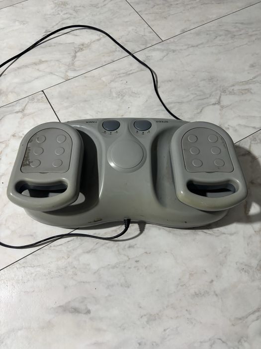 Aparatul de masaj Powerful Swing Massager