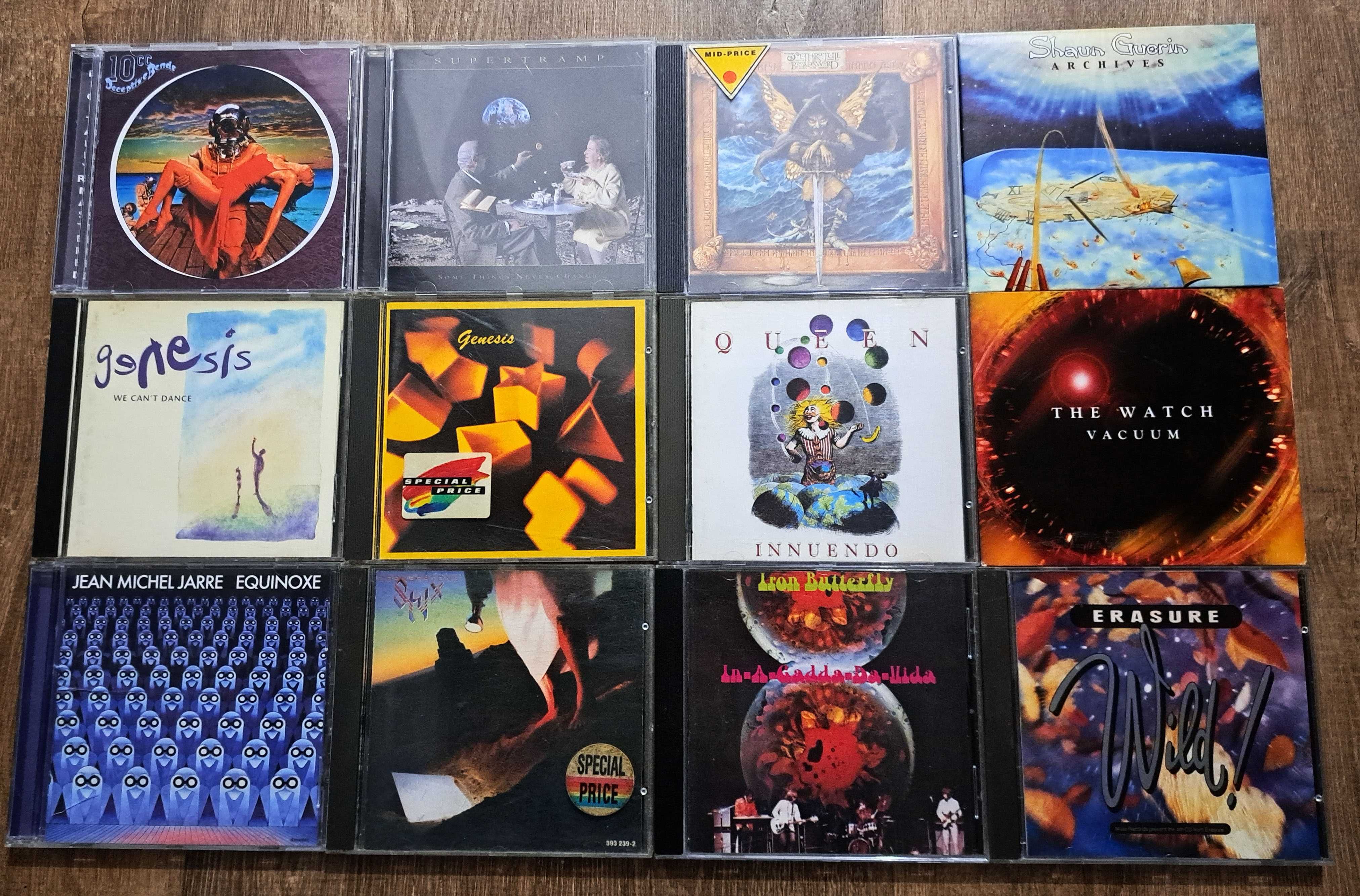 Lot 12 CD-uri originale: Queen, Genesis, Jethro Tull, Styx, J.M. Jarre