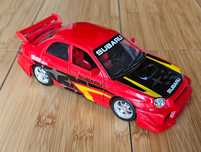 Masina de colectie Bburago Subaru Impreza WRX la scara 1/24 din metal