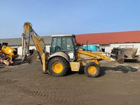 Dezmembrez New Holland NH85 NH95 buldoexcavator