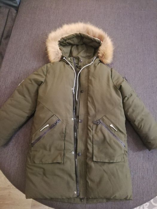 Продам зимний пуховик на мальчика