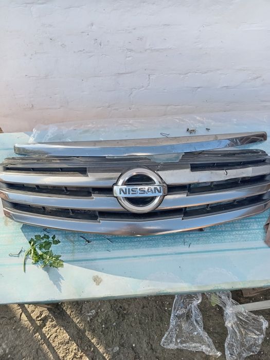 Продам решотку радиатора нисан альмера G15