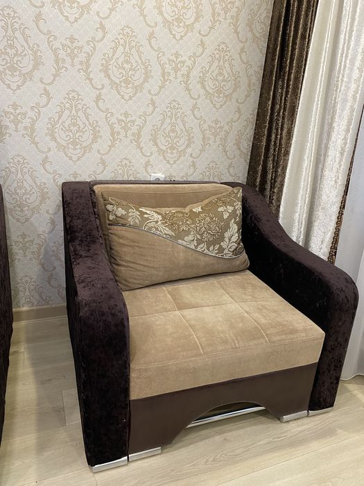 Кресло раскладное ТОРГ УМЕСТЕН коричневое обитое материалом ,Б/у