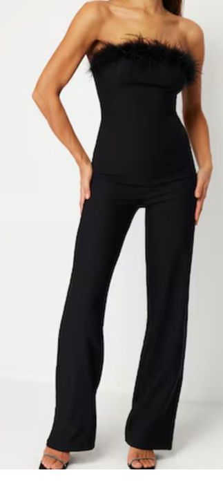 Черен гащеризон с пера