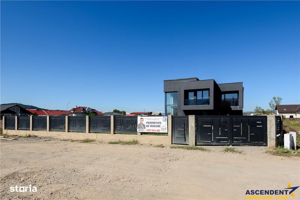 Casa noua in Harman, cu arhitectura moderna si spatii vitrate