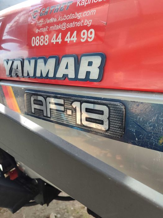 Трактор челен товарач