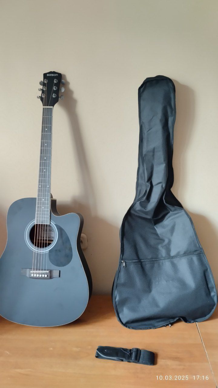 Acustik gitara holati yangi