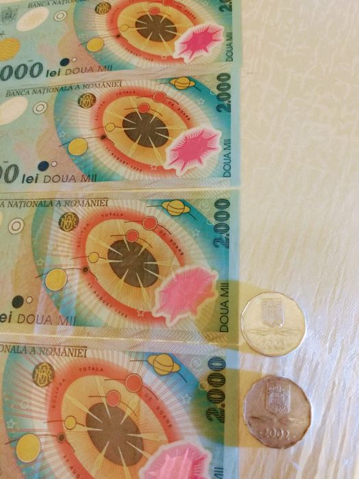 Vand 4 bancnote eclipsa 1999 si 2 monezi 5000lei 2002