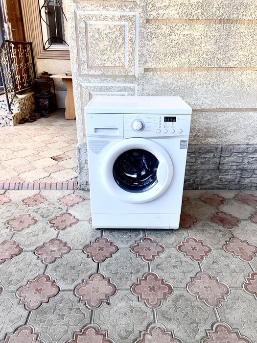 Продам стиральную машинку LG рабочая 100% гарантия