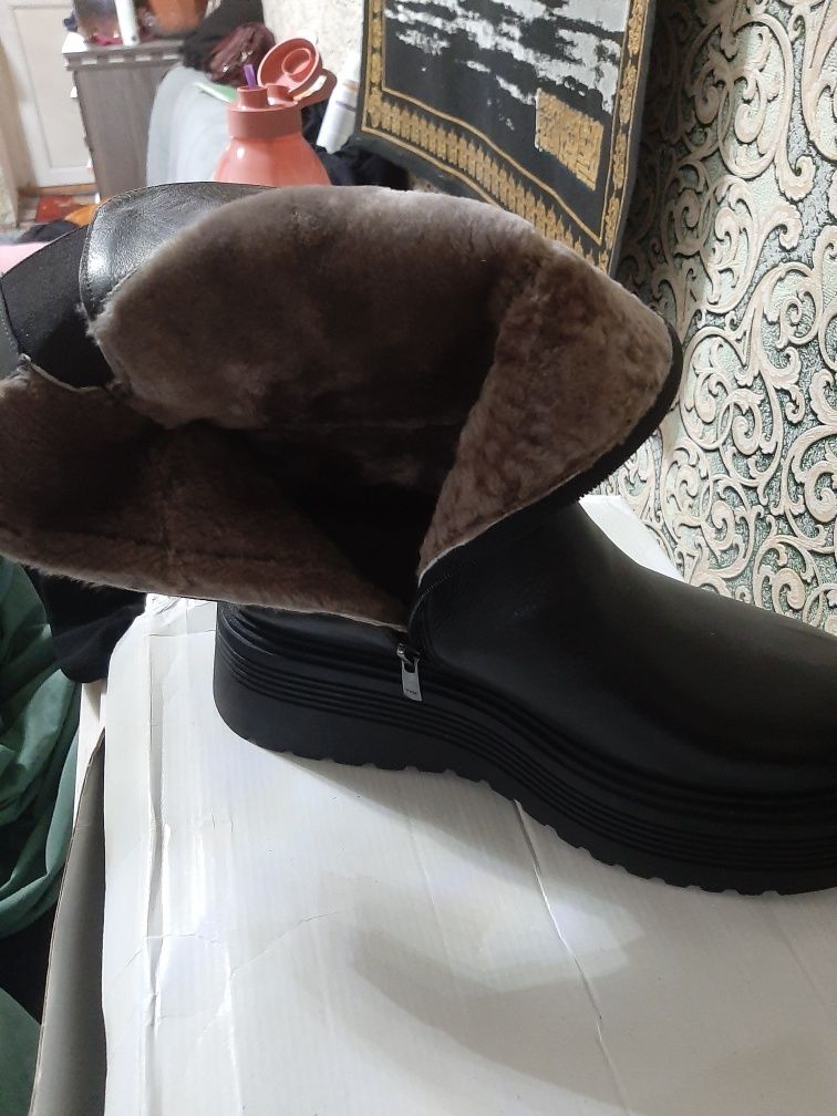 Продам зимние кожанные,новые сапоги