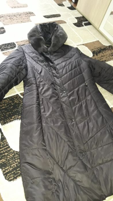 Продам пуховик 60 размер