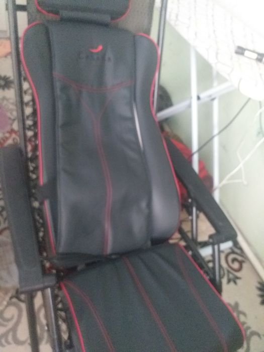 Массажный кресло